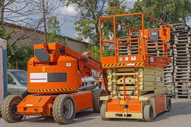 forklift truck transporting products in a warehouse in Golden Beach